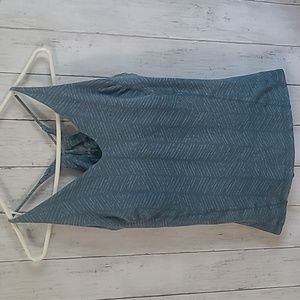 Prana blue tank with criss-cross tie back, built-in bra, patterned design.Size L